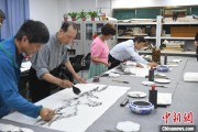 占卜六爻两岸艺术家在安徽“共绘一幅画”